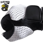 Side view of closed fist wearing Legendary USA Illest Dozer glove showing breathable white perforated deerskin and velcro strap detail made