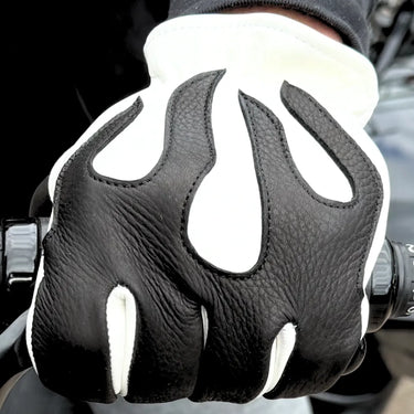 Rider wearing Legendary Spitfire deerskin motorcycle gloves gripping motorcycle handlebars, made in USA
