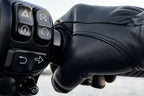 Rear view of Legendary short wrist black goatskin gloves, with hardware and stitching visible