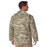 Detail view of Rothco men's camo M-65 field jacket, showing detailed construction features