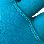 Detail view of the Spitfire Neon Blue Flame Gloves highlighting its features made in USA