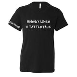 Front view of Little Legends USA kids black T-shirt with bold white text "Nobody Likes a Tattletale", Made in USA