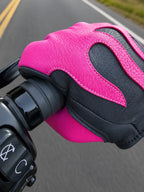 Spitfire Black/Neon Pink Gloves shown in a riding setting made in USA, a motorcycle glove — view 5 of 6