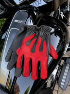 Spitfire Black/Red Touchscreen Gloves shown in a riding setting made in USA, a motorcycle glove